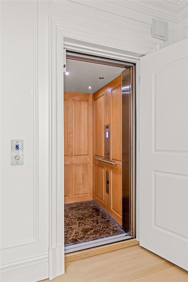 7 Beverly Rd, Kensington, NY 11021 - elevator with wood finished floors