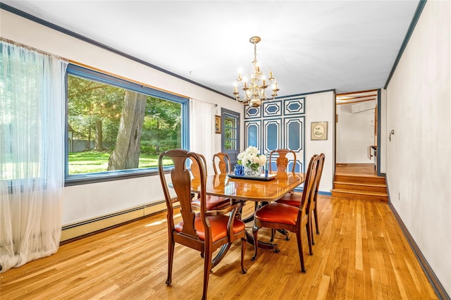 63 Lexington Dr, Croton-On-Hudson, NY 10520 - dining space with a chandelier, light wood-type flooring, a baseboard heating unit, ornamental molding, and baseboards