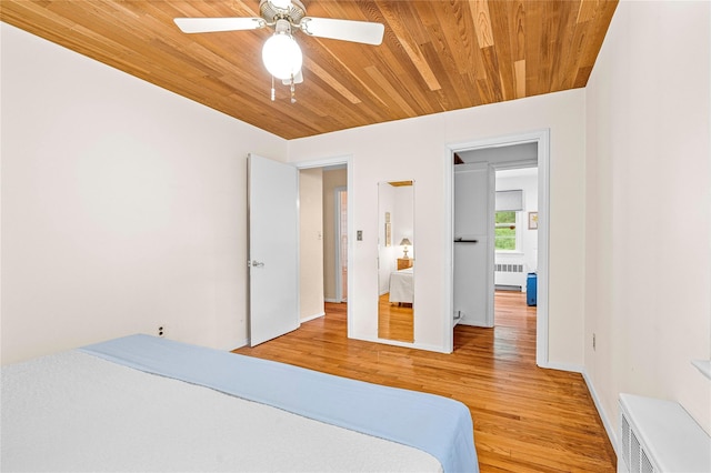 63 Lexington Dr, Croton-On-Hudson, NY 10520 - bedroom featuring radiator heating unit, wood finished floors, wooden ceiling, ceiling fan, and baseboards