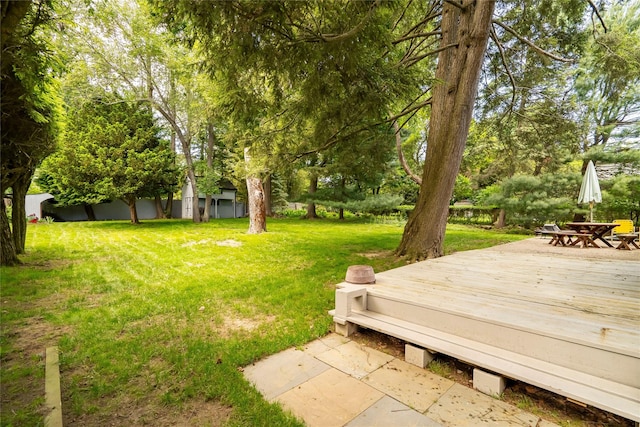 63 Lexington Dr, Croton-On-Hudson, NY 10520 - view of grassy yard with a deck, outdoor dining area, and view of scattered trees