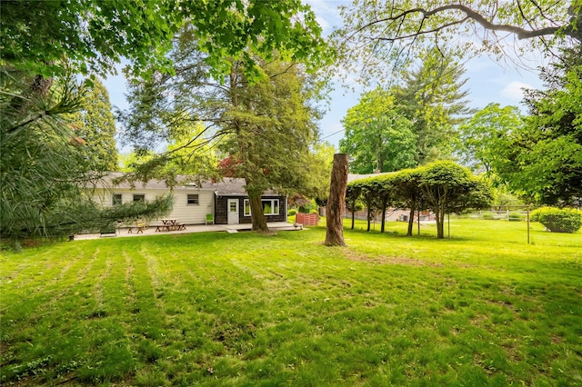 63 Lexington Dr, Croton-On-Hudson, NY 10520 - view of grassy yard with a patio