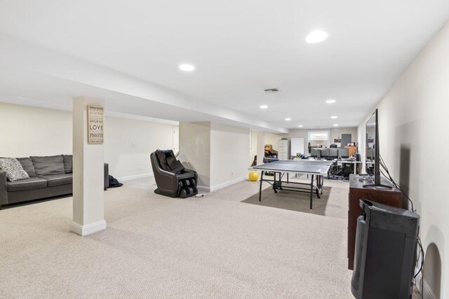recreation room with carpet, recessed lighting, and baseboards
