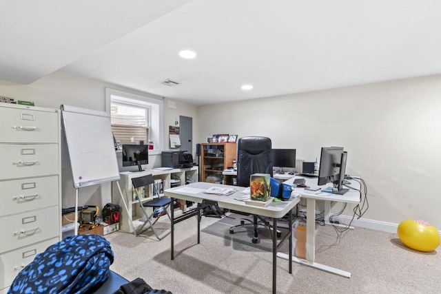 carpeted office space with baseboards and recessed lighting
