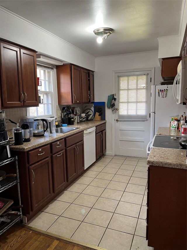 11 Acorn Ln, Stony Brook, NY 11790 - kitchen with white appliances, a sink, tasteful backsplash, dark brown cabinetry, and crown molding