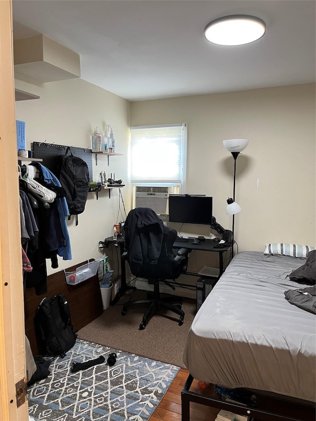11 Acorn Ln, Stony Brook, NY 11790 - bedroom featuring cooling unit and wood finished floors