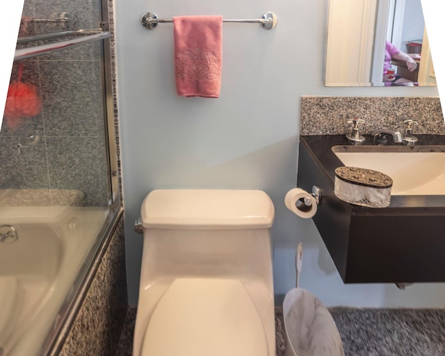160 Cabrini Blvd Unit 62, New York Manhattan, NY 10033 - full bathroom with vanity, toilet, and enclosed tub / shower combo