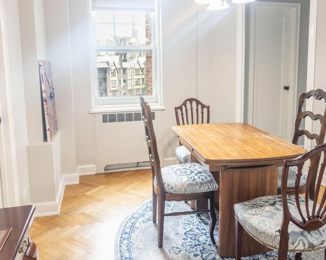 160 Cabrini Blvd Unit 62, New York Manhattan, NY 10033 - dining area featuring radiator and baseboards