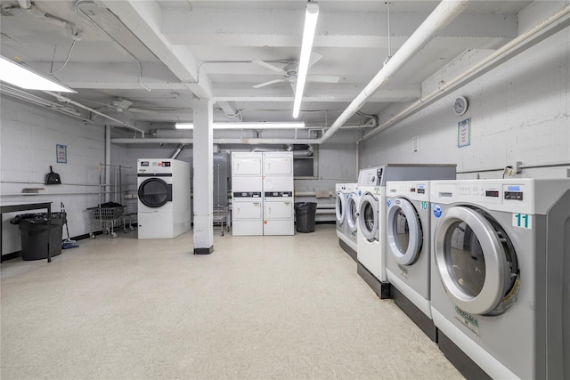 100 S Ocean Ave Unit 2E, Freeport, NY 11520 - community laundry room featuring washer and clothes dryer, a ceiling fan, light flooring, and stacked washer / dryer