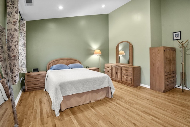 1303 Eagles Ridge Rd, Brewster, NY 10509 - bedroom featuring light wood finished floors, baseboards, lofted ceiling, and recessed lighting