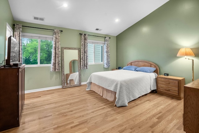 1303 Eagles Ridge Rd, Brewster, NY 10509 - bedroom with light wood-style flooring, lofted ceiling, multiple windows, baseboards, and recessed lighting
