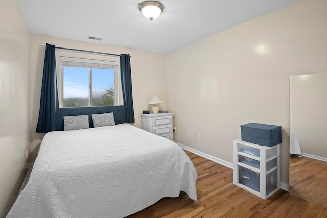 1303 Eagles Ridge Rd, Brewster, NY 10509 - bedroom with wood finished floors and baseboards