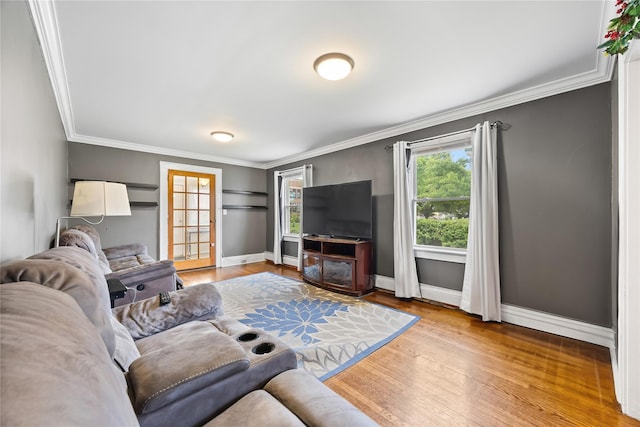 175 N Columbus Ave, Freeport, NY 11520 - living room with wood finished floors, ornamental molding, and baseboards