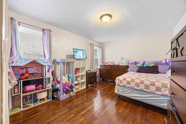 175 N Columbus Ave, Freeport, NY 11520 - bedroom with hardwood / wood-style floors and multiple windows