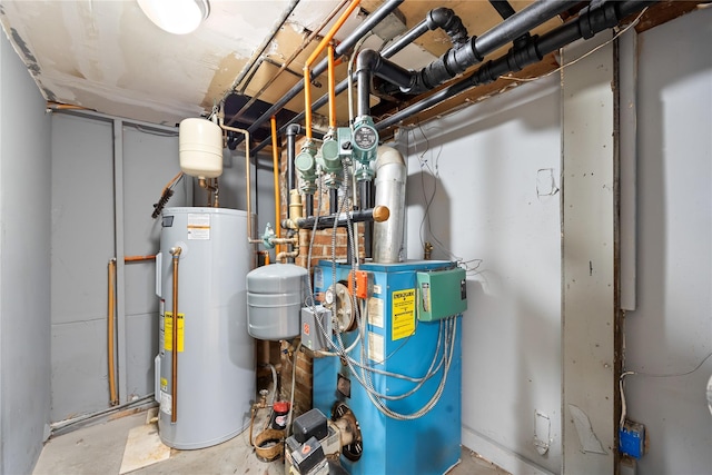 175 N Columbus Ave, Freeport, NY 11520 - utility room featuring electric water heater and a heating unit