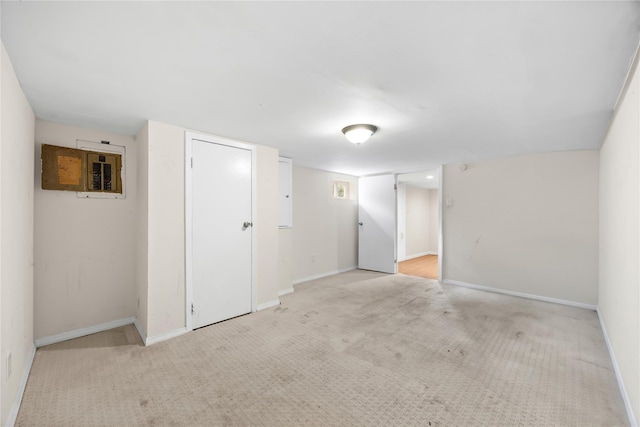 175 N Columbus Ave, Freeport, NY 11520 - empty room with light colored carpet, electric panel, and baseboards