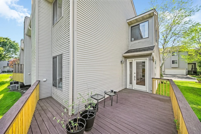 deck with cooling unit and a yard