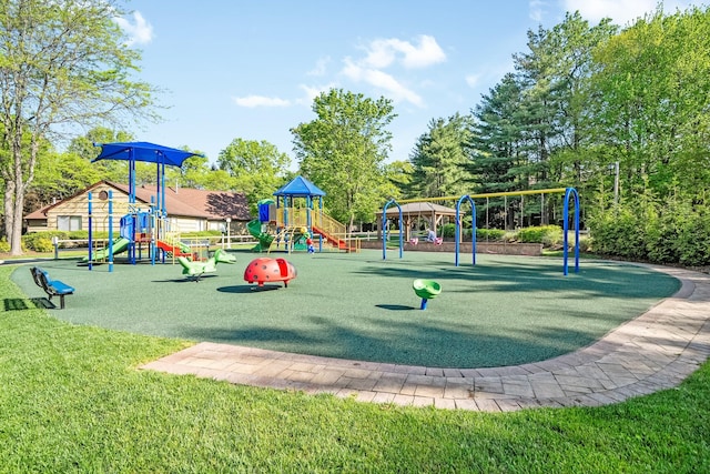 community play area featuring a lawn