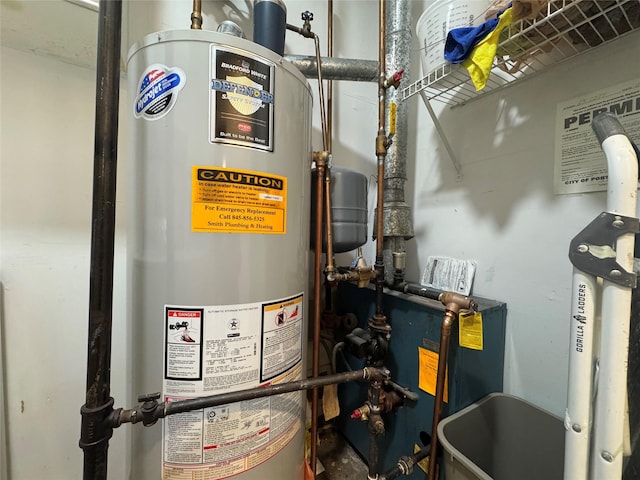 utilities featuring water heater and a heating unit