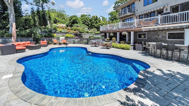 12 Sunset Path, Port Jefferson, NY 11777 - view of swimming pool featuring a patio and an outdoor living space