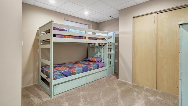 12 Sunset Path, Port Jefferson, NY 11777 - carpeted bedroom with baseboards and a drop ceiling