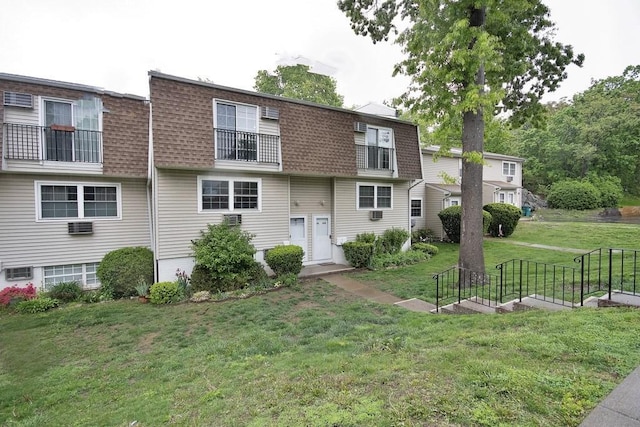 11 The Blvd Unit A4, Cold Spring, NY 10516 - view of front of house featuring roof with shingles, mansard roof, and a front yard