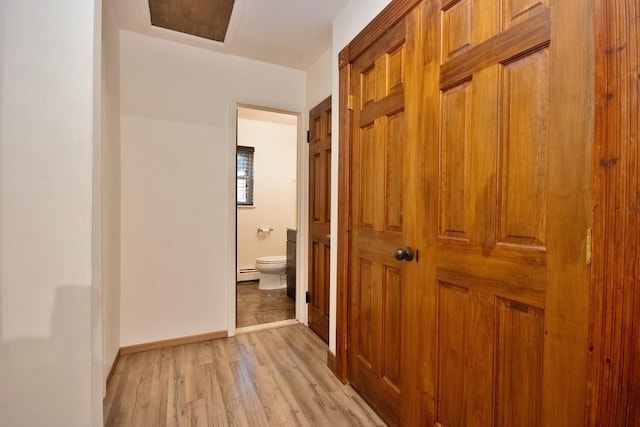 11 The Blvd Unit A4, Cold Spring, NY 10516 - hall with a baseboard radiator, light wood-type flooring, and baseboards