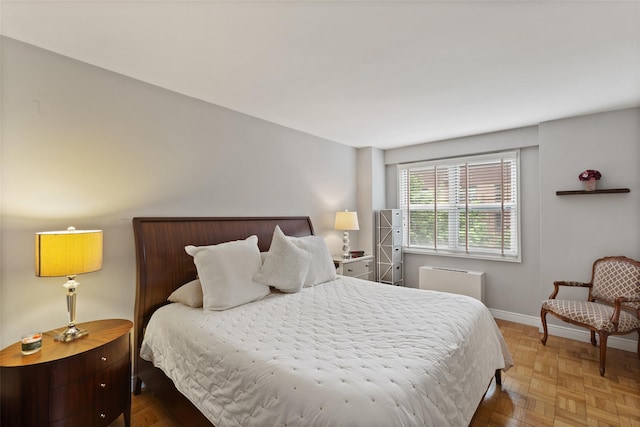 bedroom with baseboards