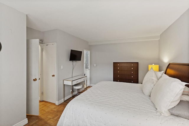 bedroom with baseboards