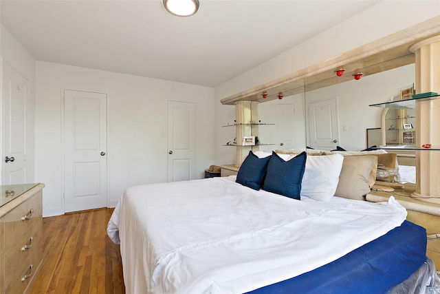 205 E 238th St Unit 22, Bronx, NY 10470 - bedroom with light wood-style flooring