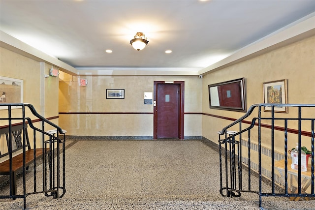 205 E 238th St Unit 22, Bronx, NY 10470 - corridor with an upstairs landing, speckle patterned floor, baseboards, recessed lighting, and elevator