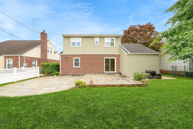 11 Durham Rd, New Hyde Park, NY 11040 - back of house with a patio and brick siding