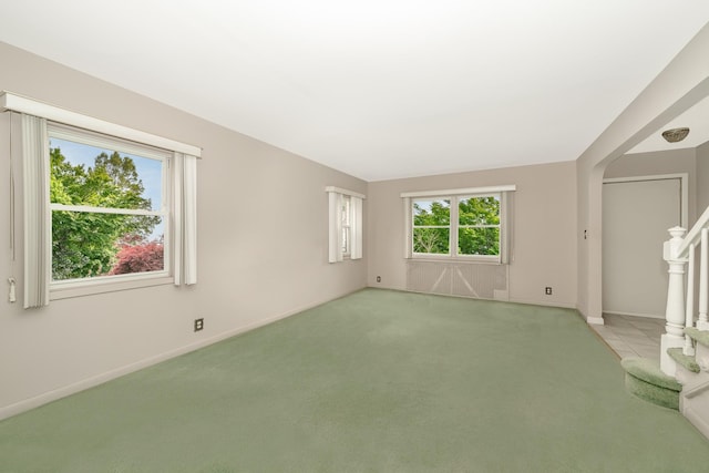 11 Durham Rd, New Hyde Park, NY 11040 - unfurnished room with light carpet and baseboards