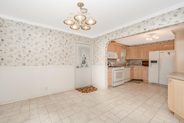 11 Durham Rd, New Hyde Park, NY 11040 - kitchen with white appliances, a chandelier, a wainscoted wall, light brown cabinets, and light countertops