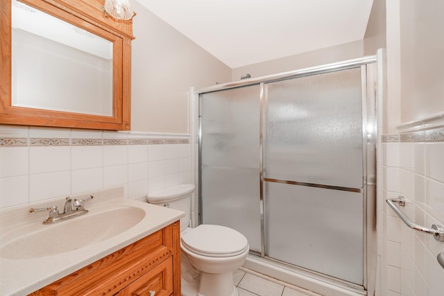 11 Durham Rd, New Hyde Park, NY 11040 - full bathroom featuring tile walls, vanity, toilet, a shower with shower door, and wainscoting