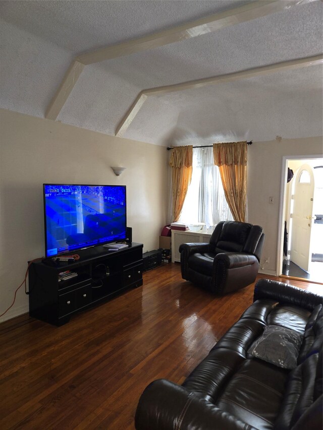 3915 Clarendon Rd, Brooklyn, NY 11203 - living room featuring lofted ceiling, wood finished floors, and a textured ceiling