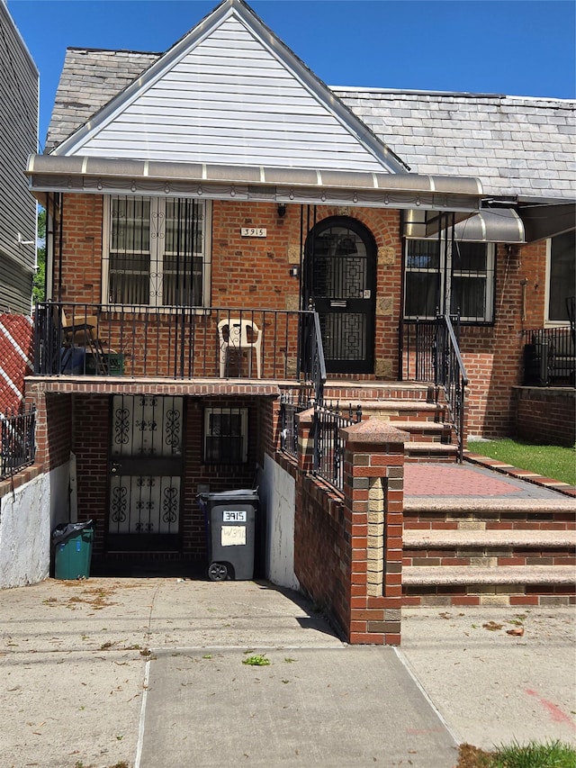 3915 Clarendon Rd, Brooklyn, NY 11203 - view of front of home featuring brick siding and covered porch