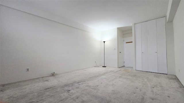 160-10 89th Ave Unit 9A, Jamaica, NY 11432 - unfurnished bedroom featuring carpet flooring
