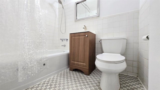 160-10 89th Ave Unit 9A, Jamaica, NY 11432 - bathroom with tile walls, toilet, tub / shower combination, and vanity