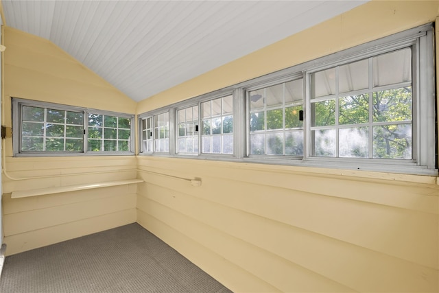 unfurnished sunroom with lofted ceiling