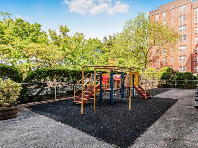 view of play area featuring fence