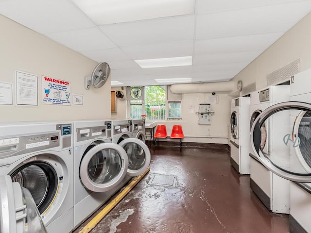 community laundry room featuring washing machine and dryer
