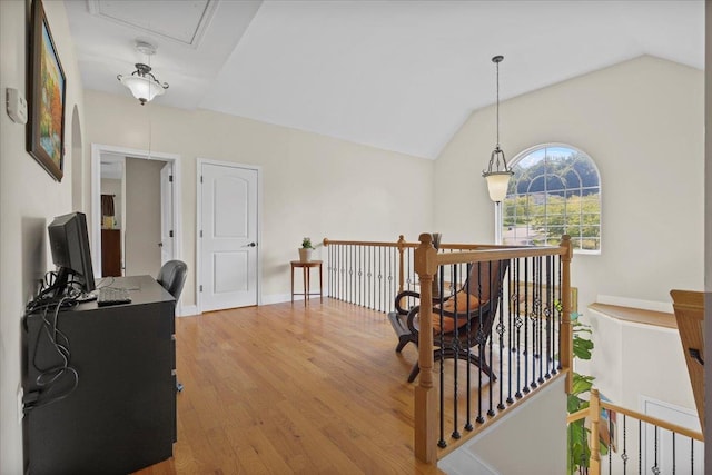 8 Tanyas Ct, Monroe, NY 10950 - corridor with an upstairs landing, wood finished floors, vaulted ceiling, attic access, and baseboards