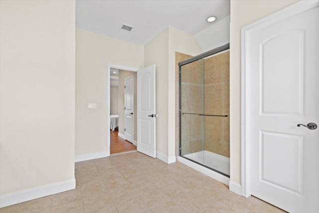 8 Tanyas Ct, Monroe, NY 10950 - ensuite bathroom with a shower stall, tile patterned flooring, and baseboards