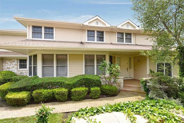 333 Baltustrol Cir, Roslyn, NY 11576 - view of front facade featuring covered porch