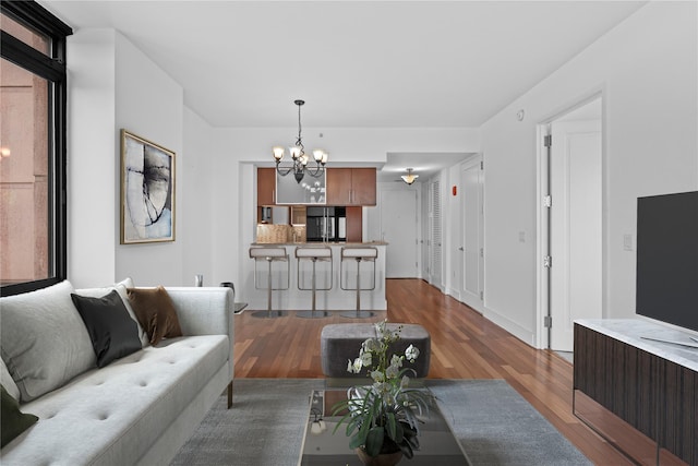175 Huguenot St Unit 1808, New Rochelle, NY 10801 - living area featuring a chandelier and wood finished floors