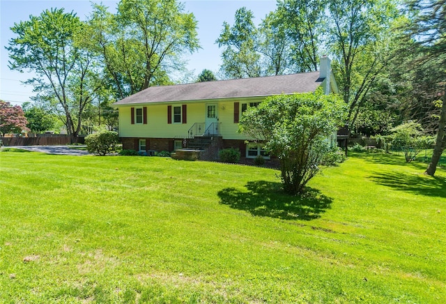 184 Cedar Valley Rd, Poughkeepsie, NY 12603 - bi-level home featuring a chimney and brick siding