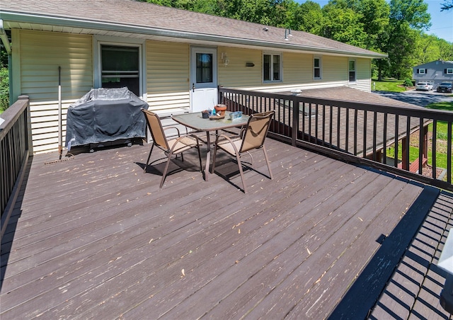 184 Cedar Valley Rd, Poughkeepsie, NY 12603 - wooden deck with outdoor dining space and grilling area