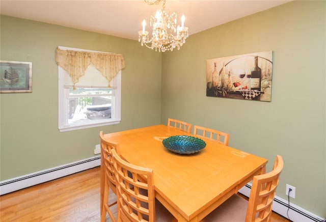 184 Cedar Valley Rd, Poughkeepsie, NY 12603 - dining room with baseboard heating, a chandelier, and wood finished floors
