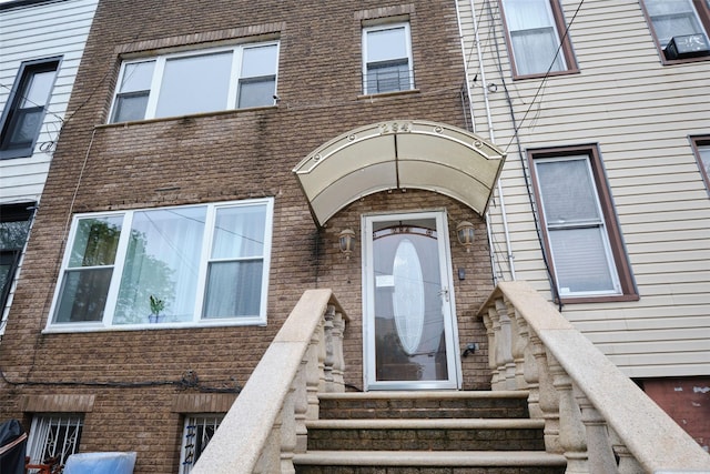 284 Hemlock St, Brooklyn, NY 11208 - property entrance featuring brick siding