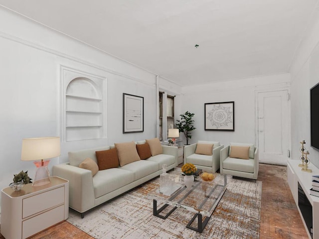 1075 Grand Concourse Unit 1N, Bronx, NY 10452 - living room with built in shelves and crown molding